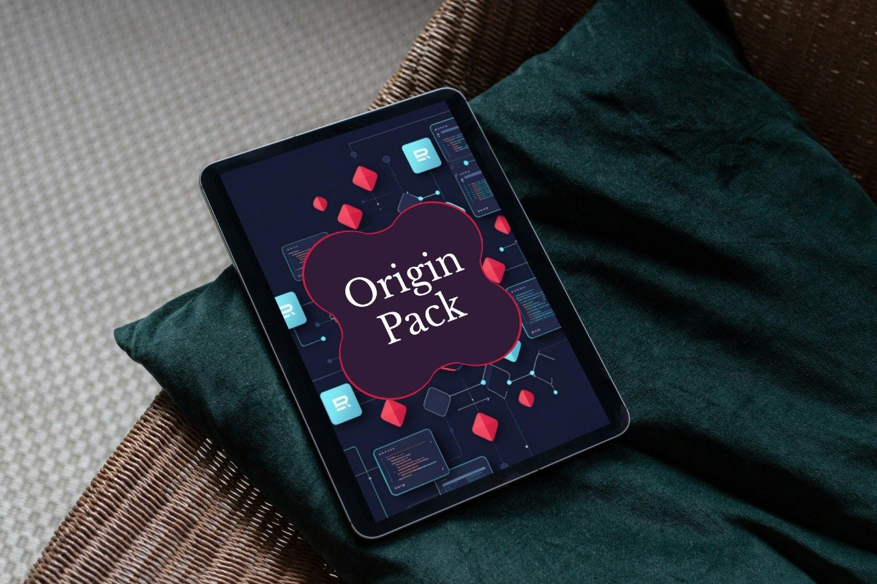 A tablet device lying on a dark green cushion over a woven chair, displaying a graphic with the words 'Origin Pack' on the screen.